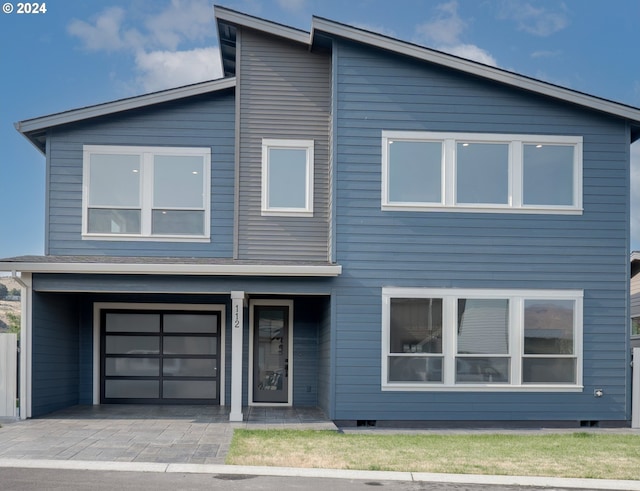 modern home with a garage and crawl space