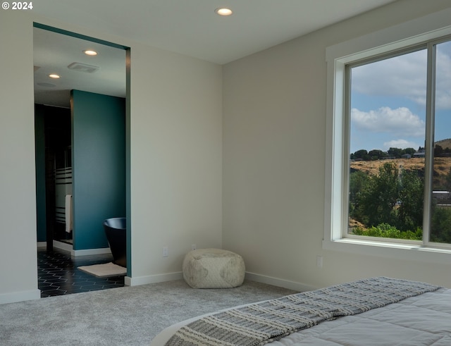 carpeted bedroom featuring visible vents, baseboards, and recessed lighting