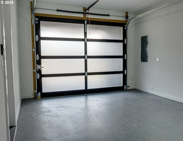 garage with electric panel and baseboards