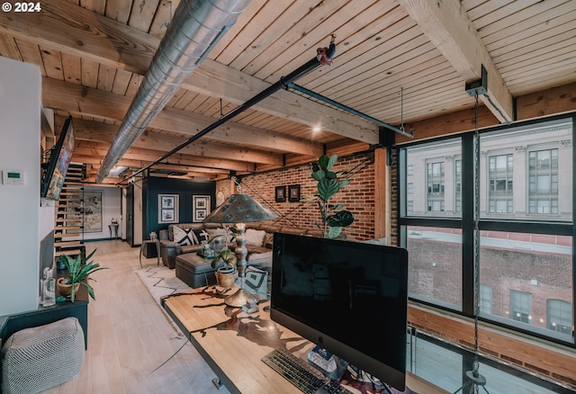 interior space featuring beam ceiling and wooden ceiling