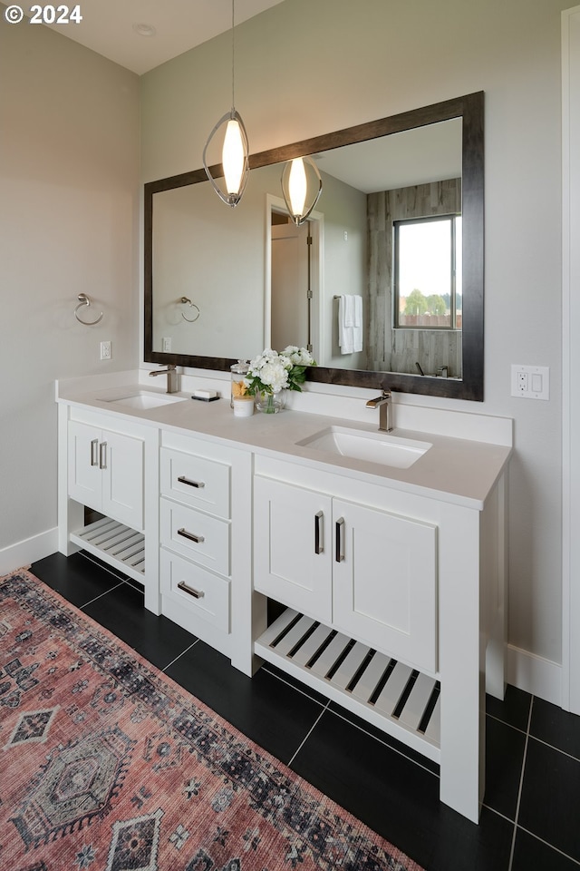 bathroom featuring tile flooring and double sink vanity