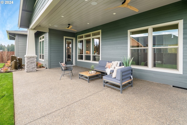 view of terrace with an outdoor hangout area and ceiling fan