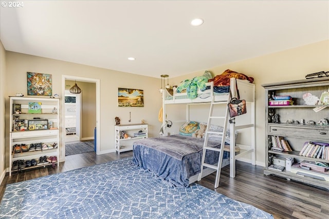 bedroom featuring dark hardwood / wood-style floors