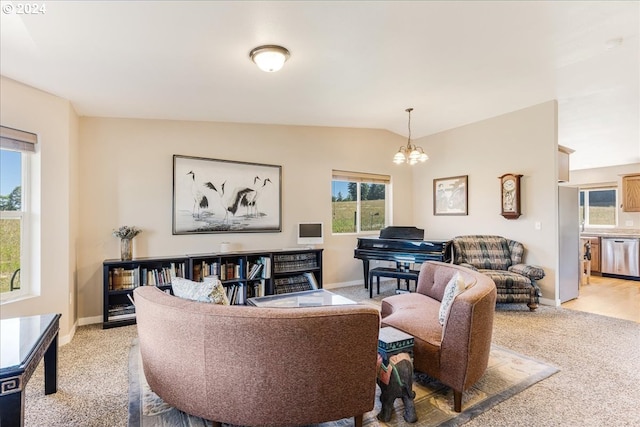 carpeted living room featuring vaulted ceiling and a notable chandelier