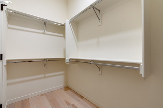 spacious closet with light wood-type flooring