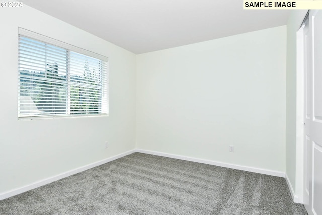3907 SW Duniway Ln, Gresham, OR 97080 - spare room featuring carpet flooring and baseboards