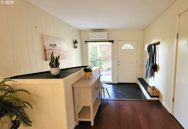 1400 W 40th St, Eugene, OR 97405 - entryway with a wall unit AC and dark wood-style flooring