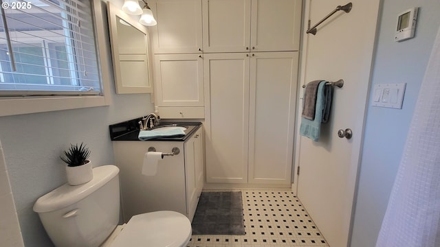 1400 W 40th St, Eugene, OR 97405 - bathroom featuring toilet and vanity