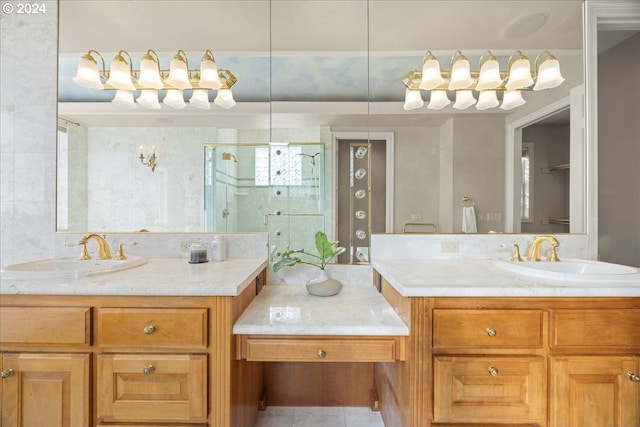 bathroom featuring tile patterned flooring, an enclosed shower, and vanity