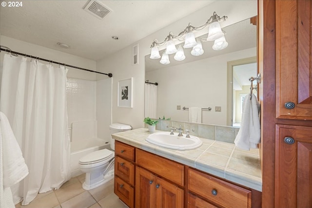 full bathroom with toilet, shower / tub combo, vanity, and tile patterned flooring