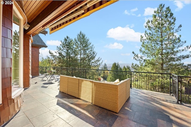 view of patio with a balcony