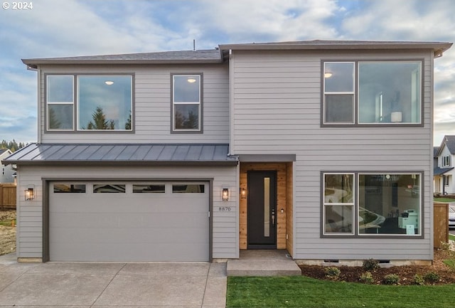 view of front of house with a garage