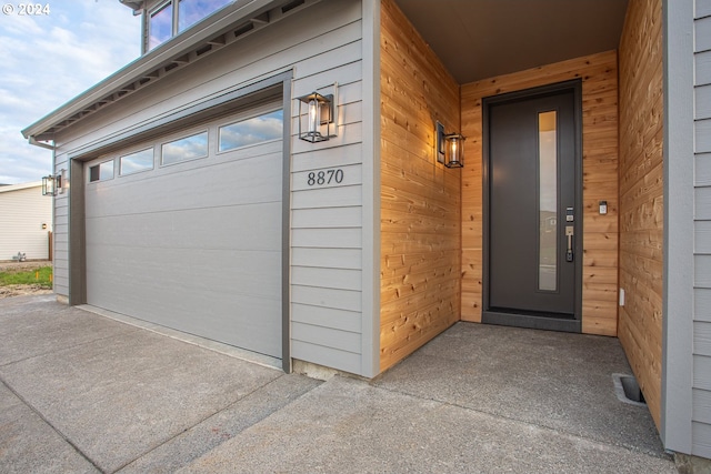 garage with wood walls