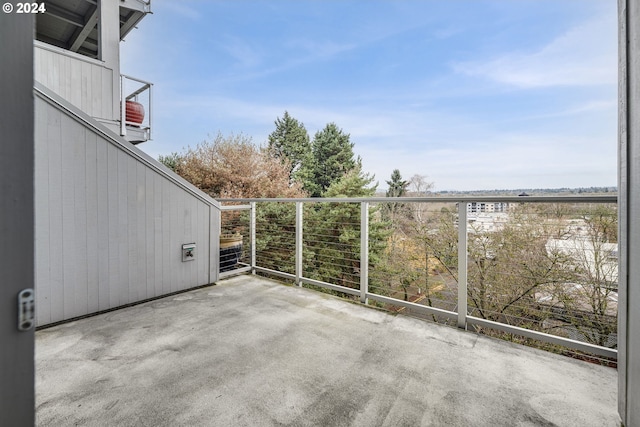 view of patio with a balcony