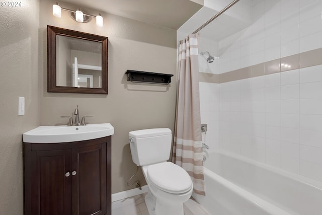 full bathroom with tile patterned flooring, vanity, toilet, and shower / bath combo with shower curtain