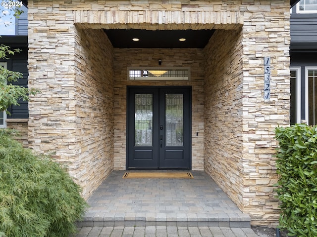 entrance to property featuring french doors