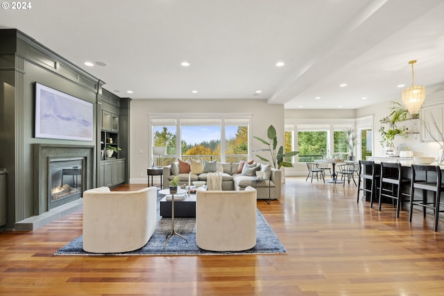 living room with light hardwood / wood-style flooring