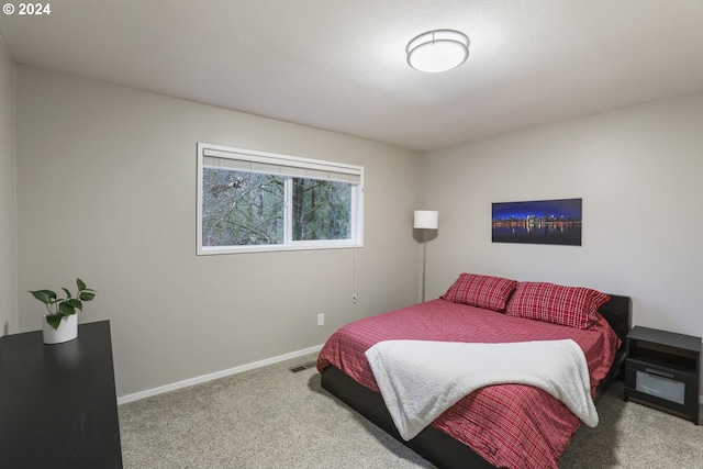 bedroom featuring carpet