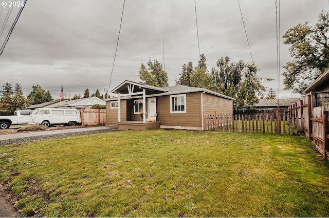 view of front of home with a front lawn