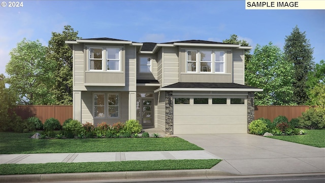 view of front of house with a garage and a front yard