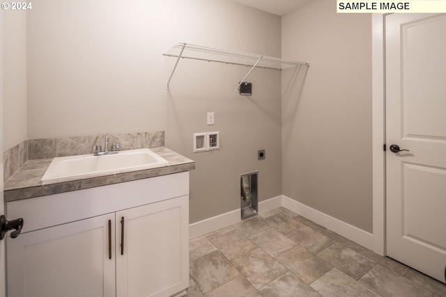 laundry room featuring hookup for an electric dryer, washer hookup, cabinets, and sink