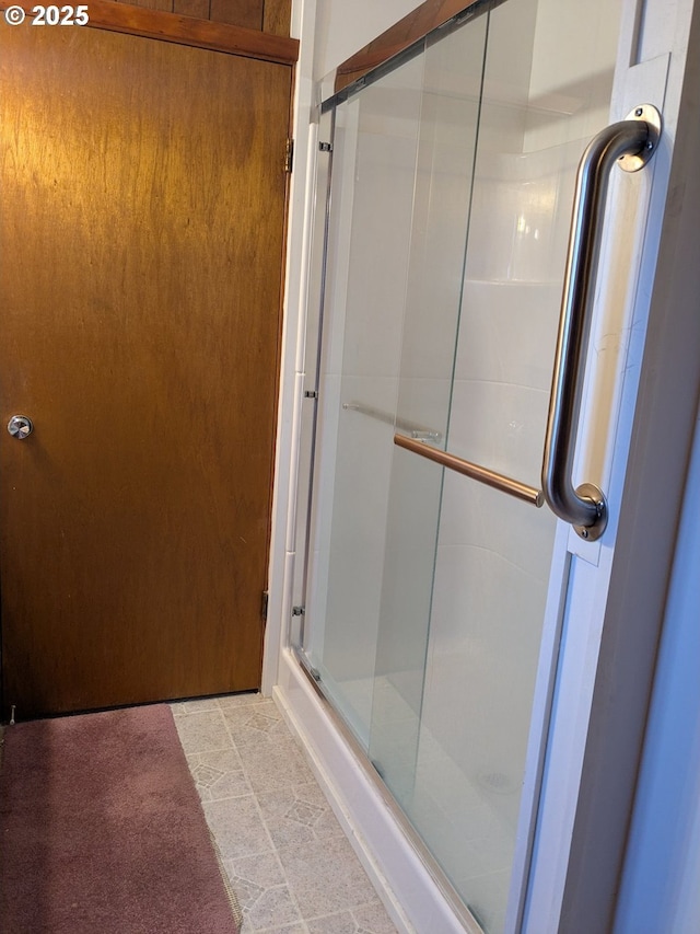 bathroom with an enclosed shower