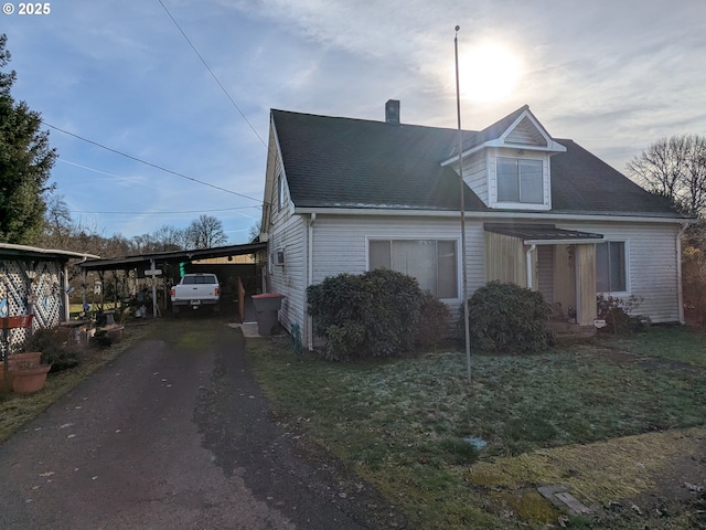 view of front of property with a carport