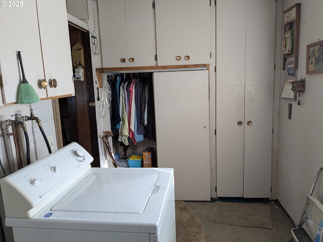 laundry area featuring cabinets and washer and dryer