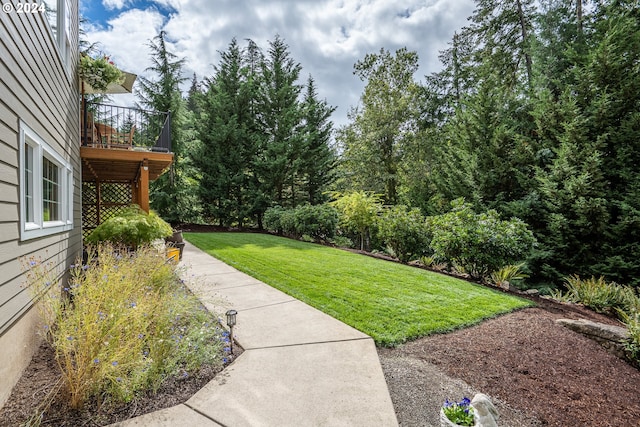 view of yard with a deck