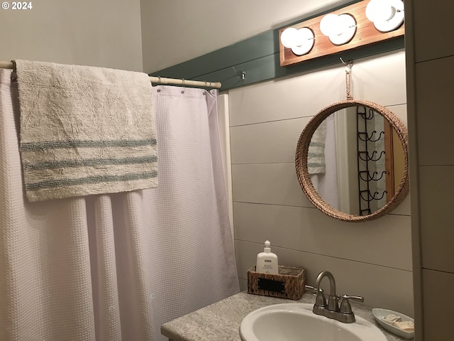 60020 Wilderness Rd, Joseph, OR 97846 - bathroom featuring a sink and curtained shower