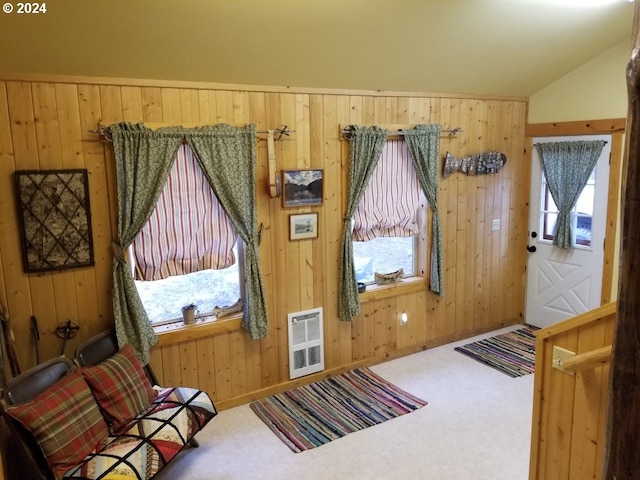 60020 Wilderness Rd, Joseph, OR 97846 - foyer entrance with plenty of natural light, heating unit, wood walls, and lofted ceiling