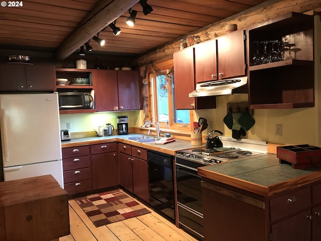 60020 Wilderness Rd, Joseph, OR 97846 - kitchen with open shelves, black appliances, a sink, under cabinet range hood, and wooden ceiling