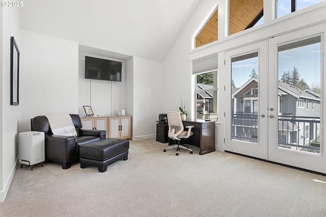 carpeted office featuring french doors, high vaulted ceiling, and baseboards