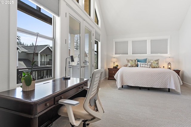 bedroom with french doors, baseboards, light colored carpet, and vaulted ceiling