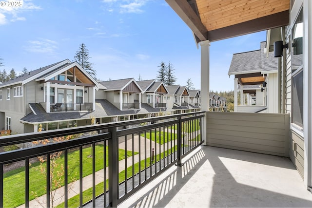 balcony featuring a residential view