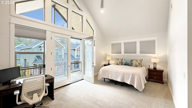 bedroom with high vaulted ceiling, access to outside, baseboards, and carpet