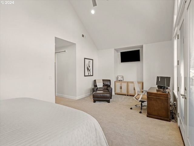 carpeted bedroom featuring high vaulted ceiling and ceiling fan