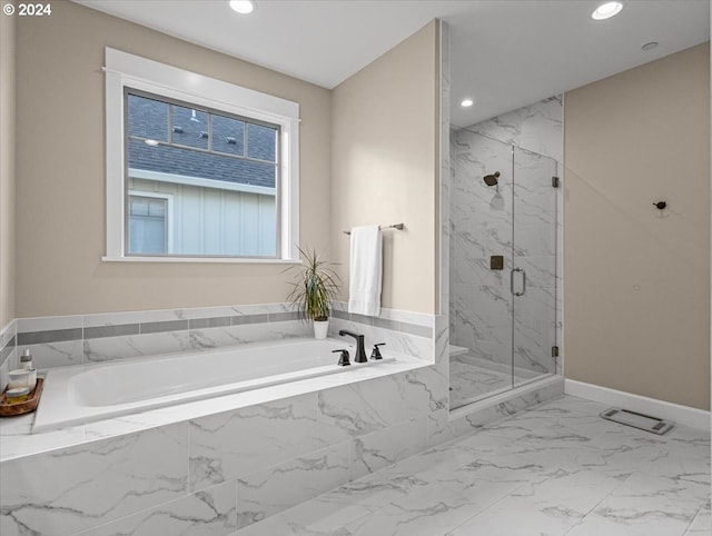 bathroom featuring marble finish floor, a garden tub, a marble finish shower, recessed lighting, and baseboards