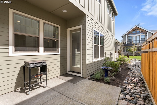 view of patio featuring fence