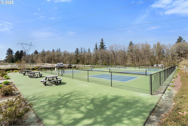 view of sport court with fence