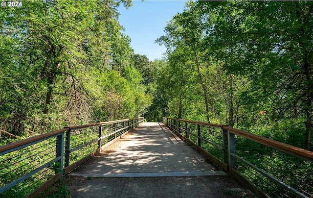 view of property's community featuring a view of trees