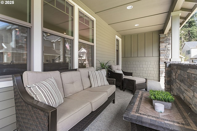 exterior space with an outdoor hangout area and covered porch