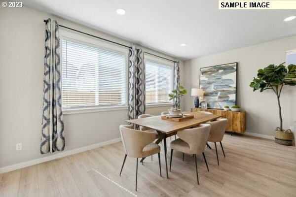 dining room featuring light hardwood / wood-style floors