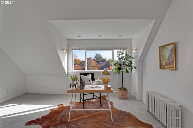 carpeted home office featuring radiator