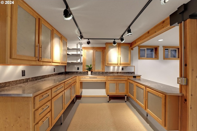 kitchen featuring track lighting