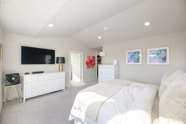 carpeted bedroom featuring vaulted ceiling