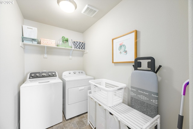 laundry area with separate washer and dryer