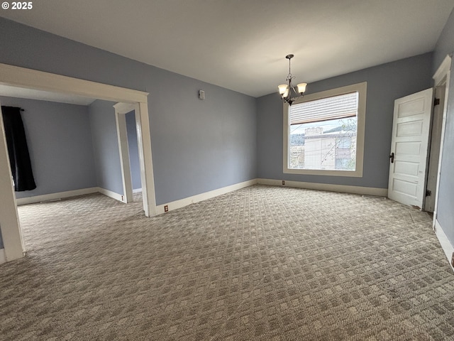 unfurnished dining area featuring light colored carpet and a chandelier