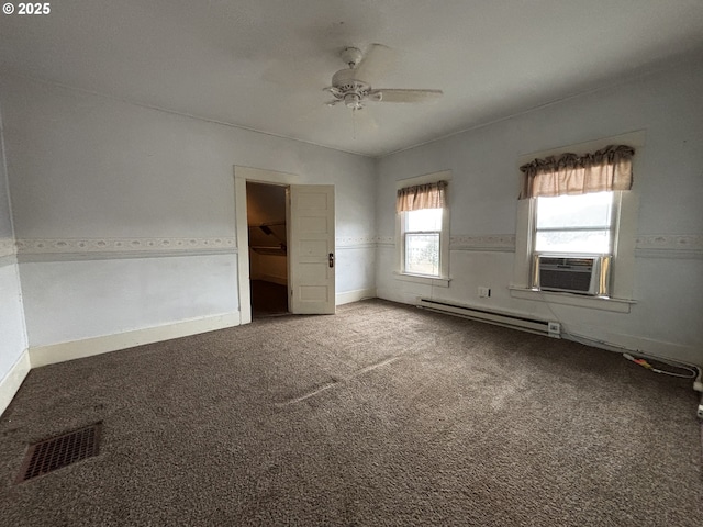 empty room with carpet, cooling unit, a baseboard heating unit, ceiling fan, and lofted ceiling