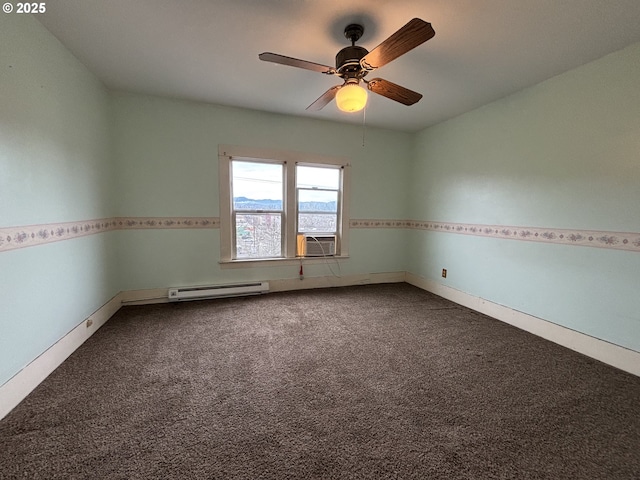 carpeted spare room featuring a baseboard radiator and ceiling fan